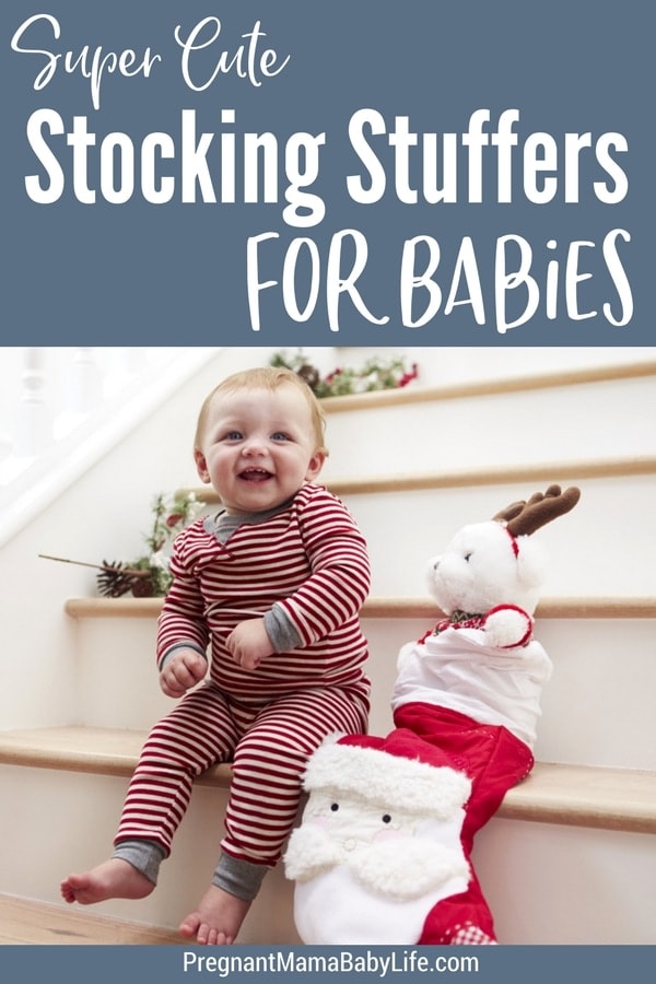 Baby with stocking on stairs and text overlay "super cute stocking stuffers for babies"